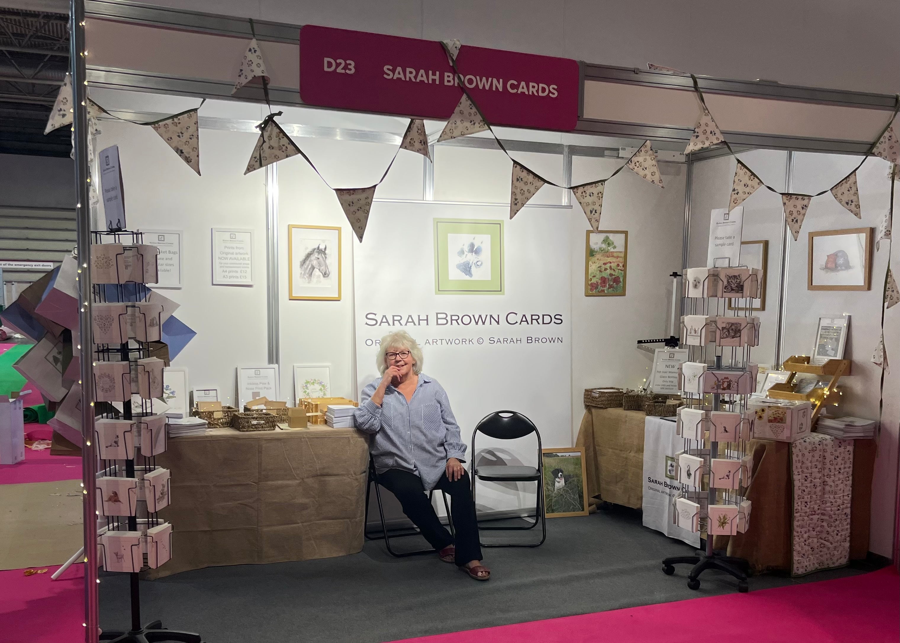 Artist Sarah Brown Cards exhibiting her pet sympathy cards and other products at a veterinary show 